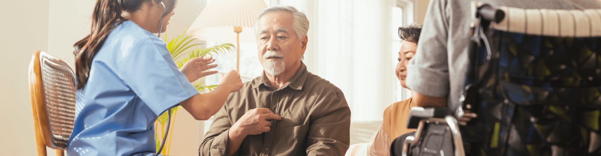 person with stethoscope with other people